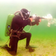 Illustration for article titled Scuba Diving In A War Zone? Better Bring Your Underwater Gun!